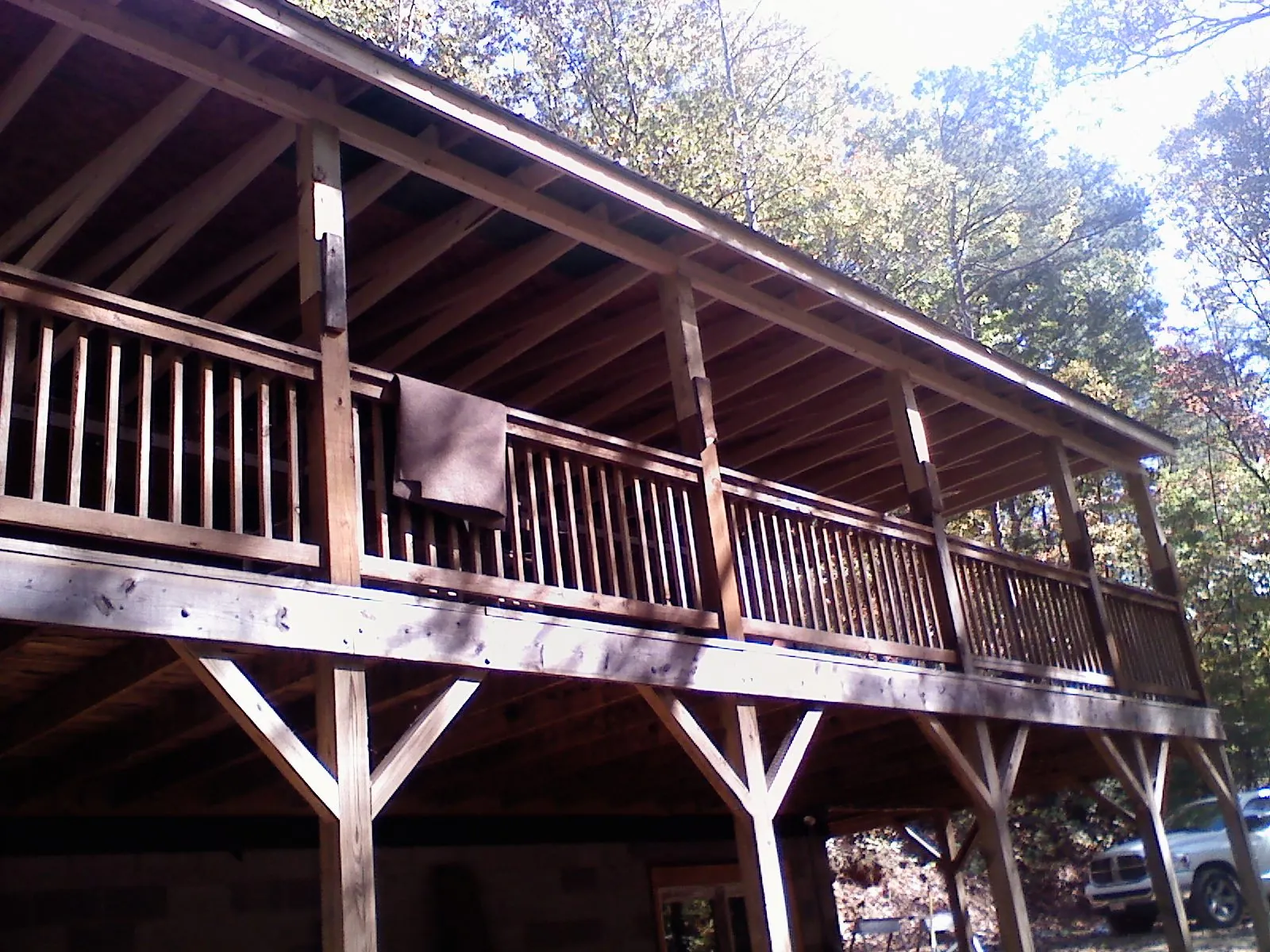 Timber framing under a new elevated porch and deck — Roof Leak Repair in Elk City by Roofing Brothers